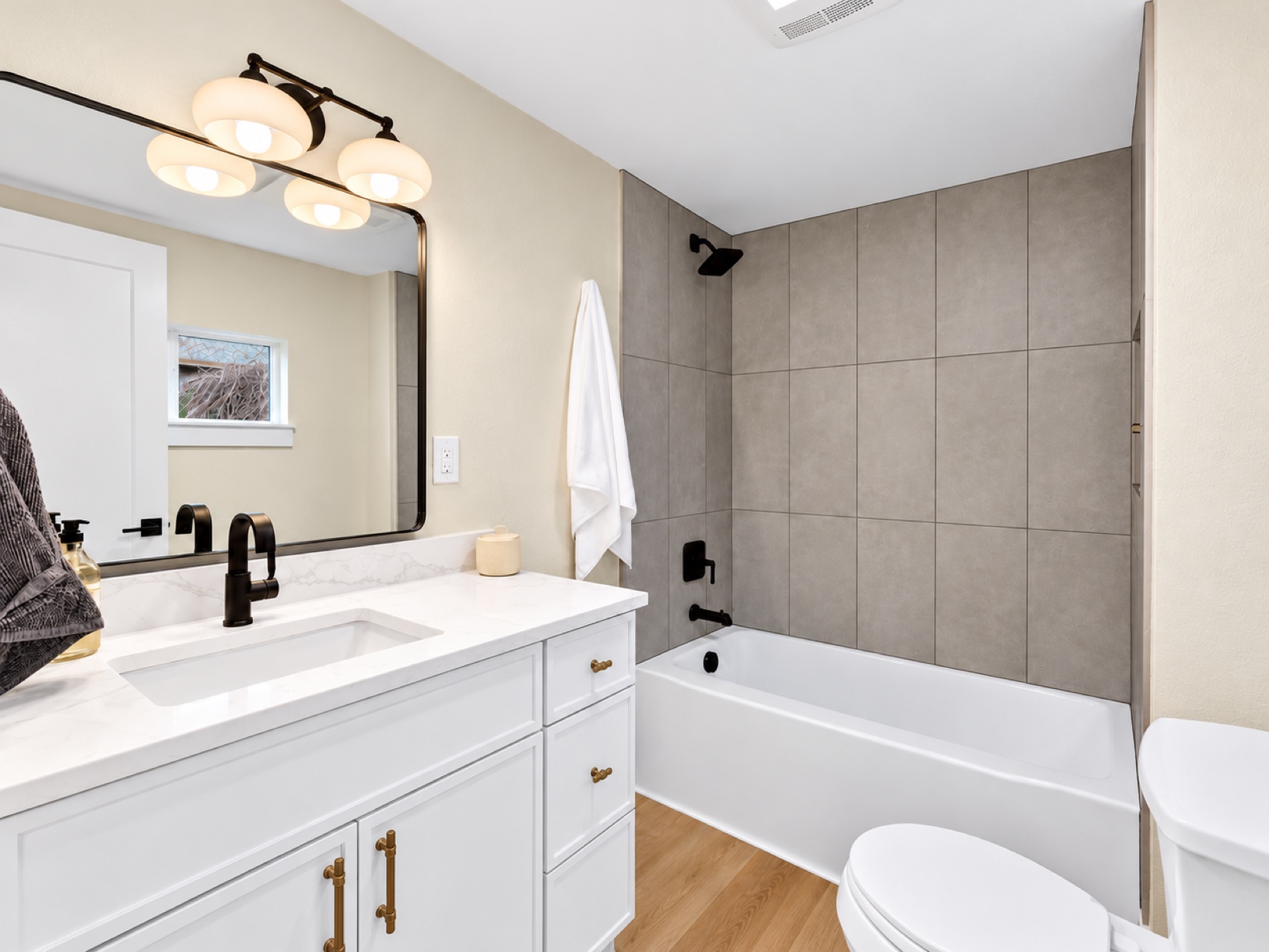 Bright bathroom with a freestanding tub and a vessel sink